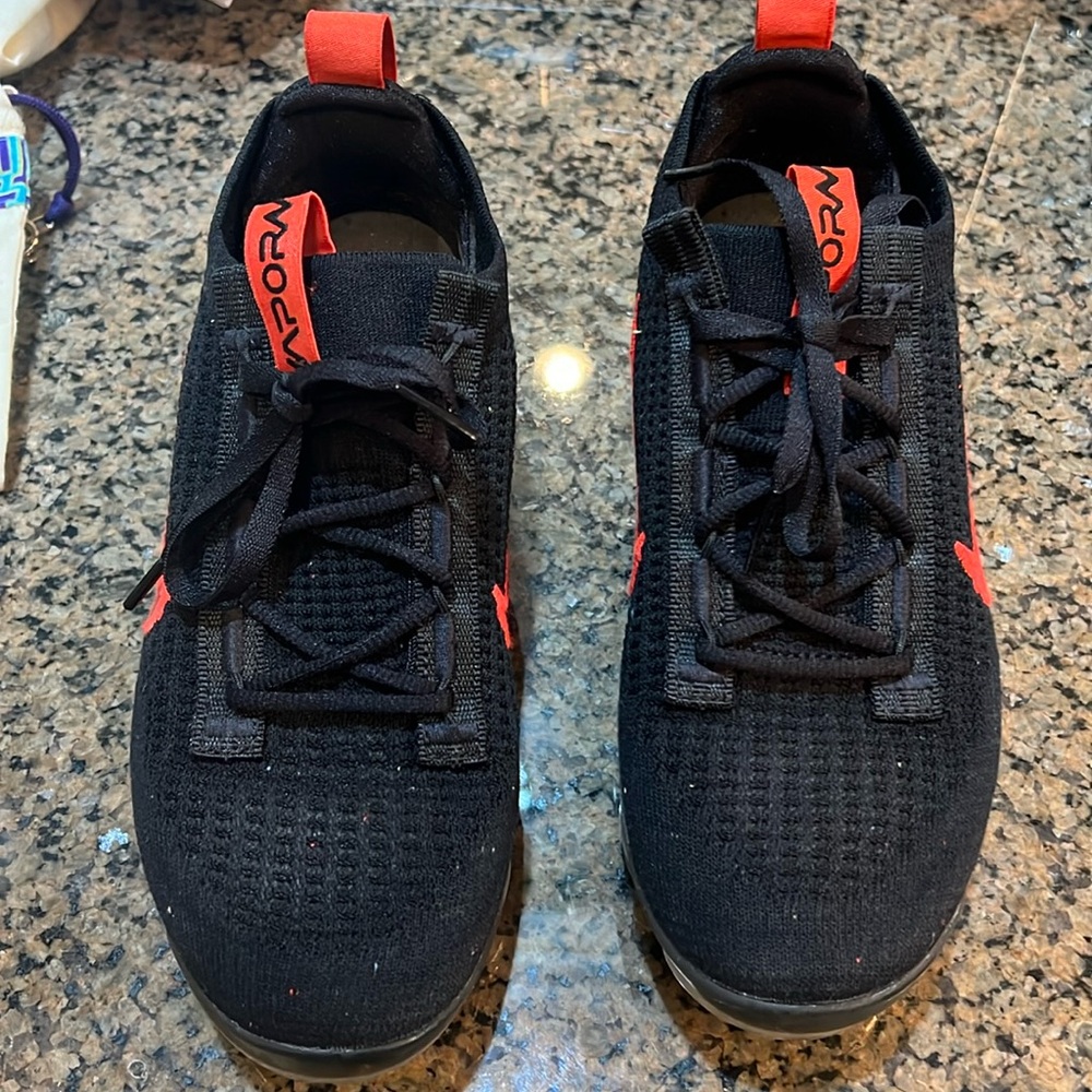 Black/red/ cheetah Nike vapor airmax. EUC. Sz 6.5 but they do run a little big.